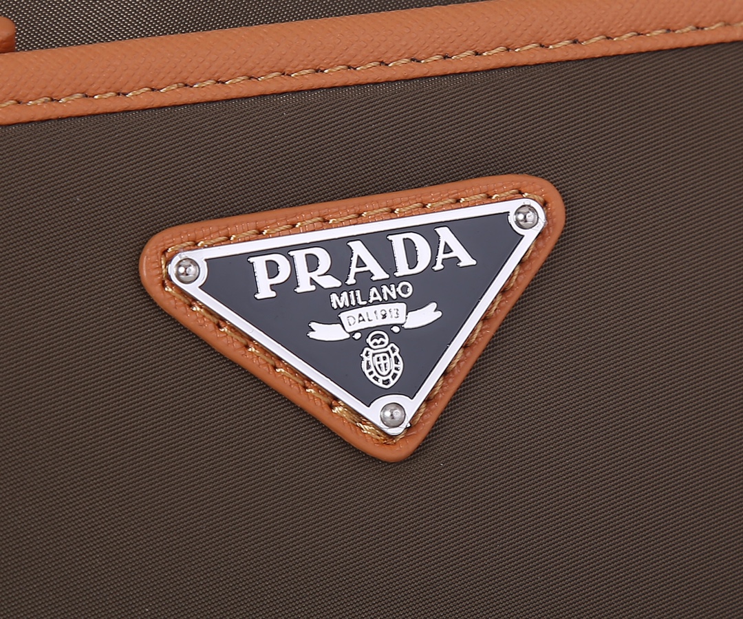 Pra*a nylon and saffiano leather bag with strap brown 2vh048 23 x 16 x 7 cm