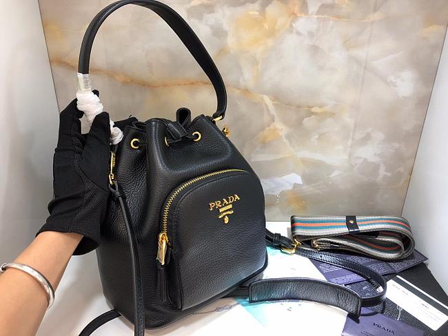 Pra*a bucket bag with metal logo and shoulder strap black 1be030 21 × 25 × 15 cm